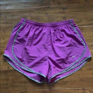 Purple Nike shorts